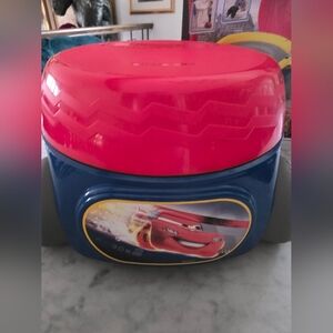 The item shown is a Disney Cars Racing Mission 3-in-1 Potty System.